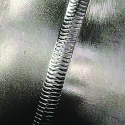 Close-up of a finished metal weld bead from the Stellar Welding media collection